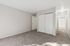 Bedroom with closed closets and carpets
