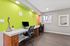 Community business center with desk and computer