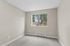 bedroom 2 in C1 renovated floorplan at Timber Flats with window