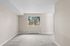 primary bedroom in C1 renovated floorplan at Timber Flats windows