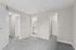 angle 2 of primary bedroom in B1 renovated floorplan at Timber Flats with walk-in closet and bathroom