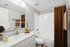 Virtually staged bathroom with shower curtain, towel, soap