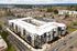 Drone view of Orrin showing the wholw building and street with Costco next door