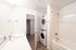 Orrin bathroom with washer and dryer