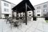 Outdoor grilling area at Orrin with covered area