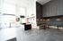 Resident common area at Orrin with kitchenette and seating
