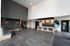 Lobby at Orrin with front desk and additional seating area