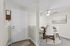 Virtually staged entryway and dining room at Timber Flats