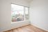One Bedroom at Lyra Apartments - Living room with large window