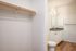 One Bedroom at Lyra Apartments - closet with doorway into the bathroom
