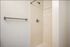 One Bedroom at Lyra Apartments - Bathroom with walk-in shower and towel bar