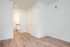One-Bedroom at Lyra Apartments - bedroom with view into the closet and bathroom