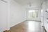 Cassi Apartments - kitchen into the living room with concrete floors