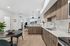 Orrin Apartments unit interior with wood cabinets and wood floors