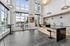 Lobby area with a kitchenette and coffee bar and seating