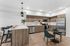 Orrin Apartments unit interior with wood cabinets and wood floors