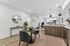 Kitchen at Orrin with a dining table and barstool seating