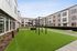 Courtyard at Orrin with outdoor turf and a workout area