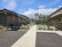 Shared courtyard and asphalt parking area at Lakeside Place.