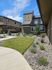 Lush green lawns and landscaped pathways at Lakeside Place.