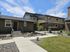 Private unit entrance with professional landscaping at Lakeside Place.