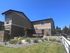 Stylish brown and tan building exterior at Lakeside Place apartments.