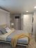 Stylishly decorated bedroom highlighting modern living at Lakeside Place.