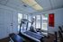 Fitness center interior showing a professional treadmill machine at CAMPBELL PARK.
