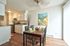 Compact dining alcove area adjacent to the apartment kitchen at CAMPBELL PARK.
