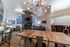 Polished wooden conference table inside the resident clubhouse at Berkeley Heights Apartment Homes.