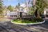 Paved leasing office roundabout entrance at Berkeley Heights Apartment Homes.