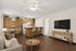 Virtually Staged living and dining room at Orchard Mesa with a dining table, coffee table and couch