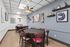 Community dining room at Orchard Mesa with tables and chairs
