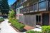 Creston Villa exterior with landscaping and fenced in areas