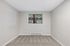 Bedroom at Timber Flats with carpet and a window