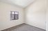 bedroom at ventura villas with small window