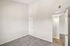 bedroom at ventura villas with tall ceilings and carpet