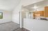 living room in 2x1 floorplan at ventura villas into kitchen
