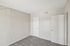 bedroom at ventura villas with closet and carpet