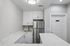 community room at ventura villas with a fridge, sink and storage