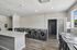 laundry facility at ventura villas with island and full-size washer and dryers