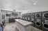 laundry facility at ventura villas with island and full-size washer and dryers