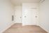 bedroom at Cedarline with closet and wood floors