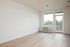 Living room with wood floors and windows