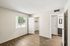 Bright Deer Valley Village bedroom with vinyl flooring and views of the closet and bathroom.