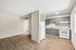 Deer Valley Village kitchen with grey cabinetry, white appliances, and vinyl plank flooring.