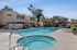 Pool and hot tub at Silver Creek with lounge chairs