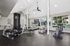 Gym at Silver Creek with treadmill, stationary bike and other equipment