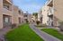 Grassy area outside in the community sidewalk