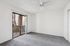 Bedroom at Silver Creek with carpet and ceiling fan with sliding glass door to the patio